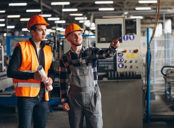 Two colleagues at a factory